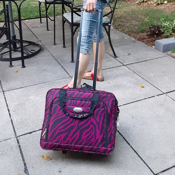 American gear Handbags - Stylish Pink Zebra Print Travel Bag